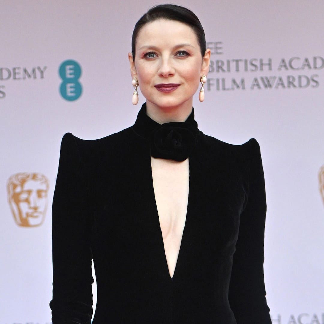 Caitriona Balfe wearing an Armani Privé gown and Van Cleef & Arpels pendant earrings. 