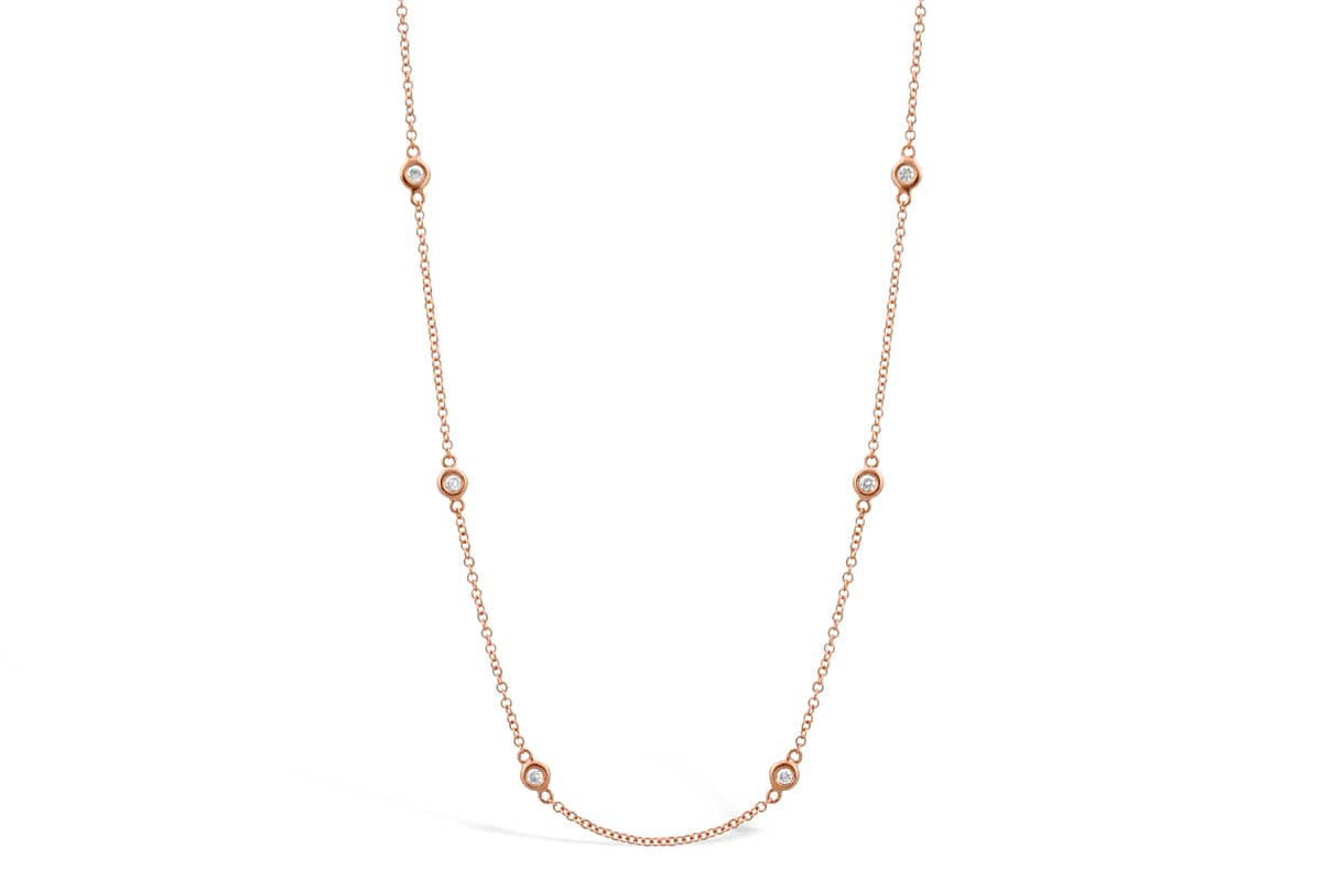 Moi by Weir & Sons Spot On Necklace.  18k rose gold and diamond dot chain necklace.